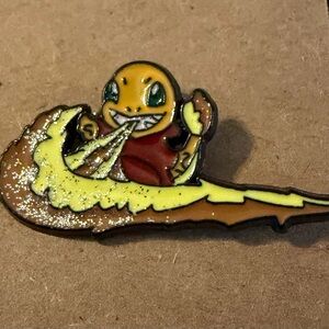 Pokémon Charmander x Nike Swoosh enamel pin